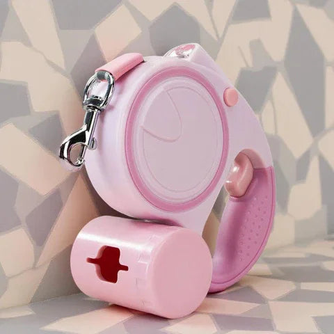 une laisse de chien retractable 3 en 1 rose