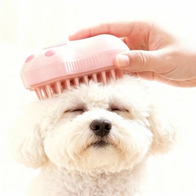 brosse pour chien a vapeur rose